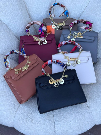 Hermès Kelly Bag (هيرمز كيلي)شنط
