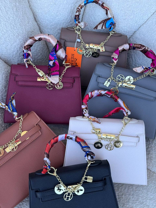 Hermès Kelly Bag (هيرمز كيلي)شنط